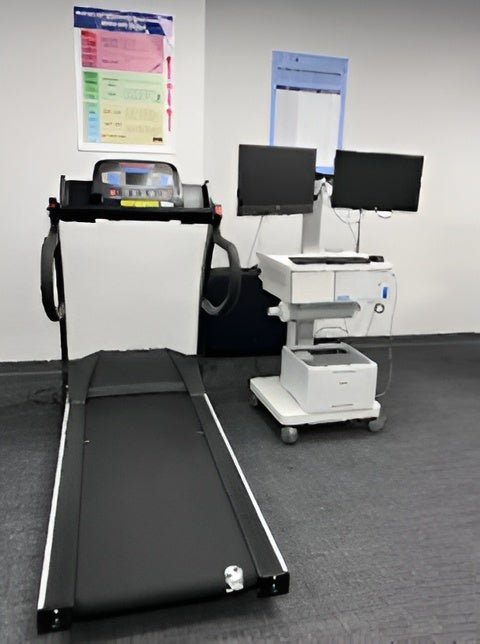 Trackmaster treadmill next to a COSMED Quark CPET metabolic cart with dual monitors in the exercise testing lab